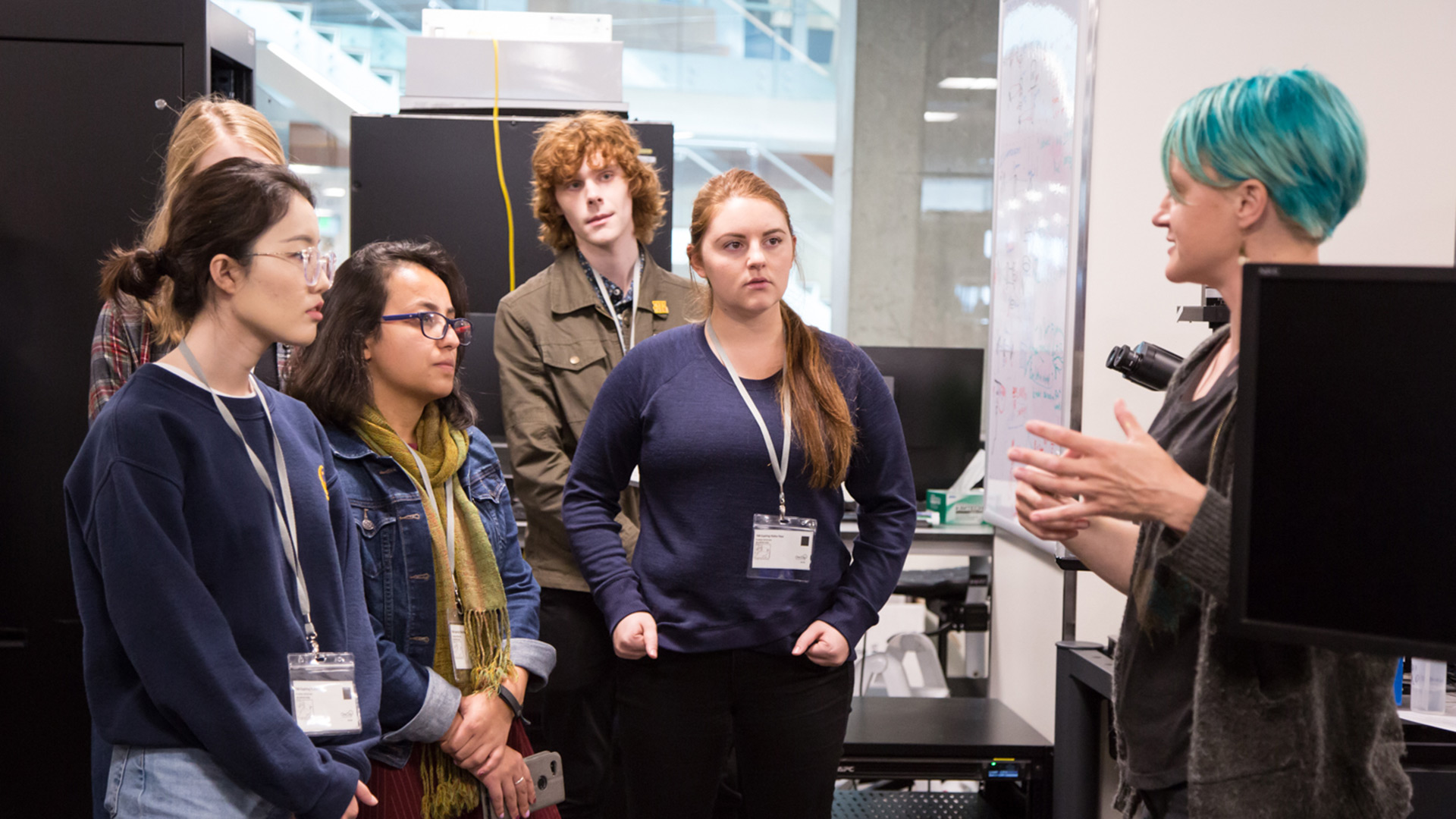 Students from the University of Washington tour a lab at the Allen Institute.