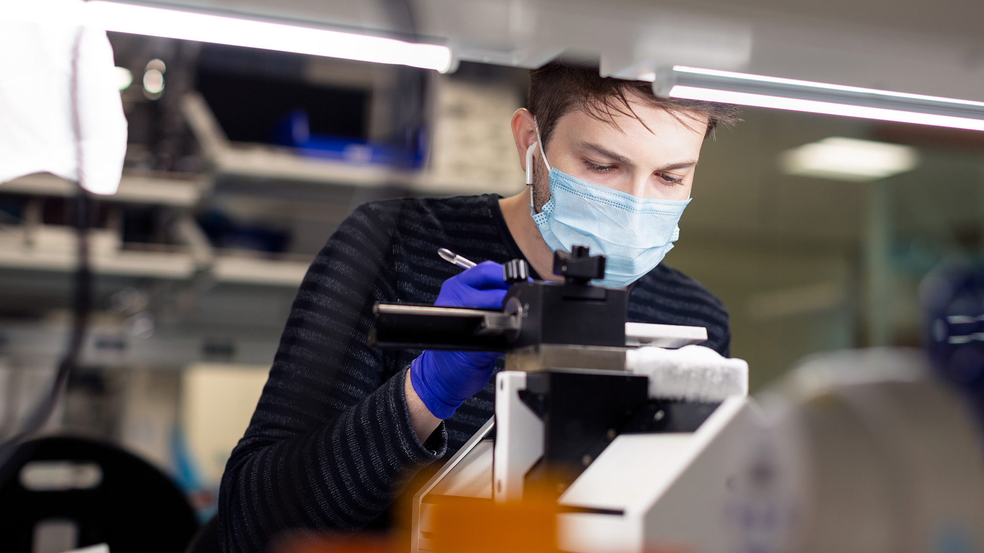 Researcher working in the lab at the Allen Institute.