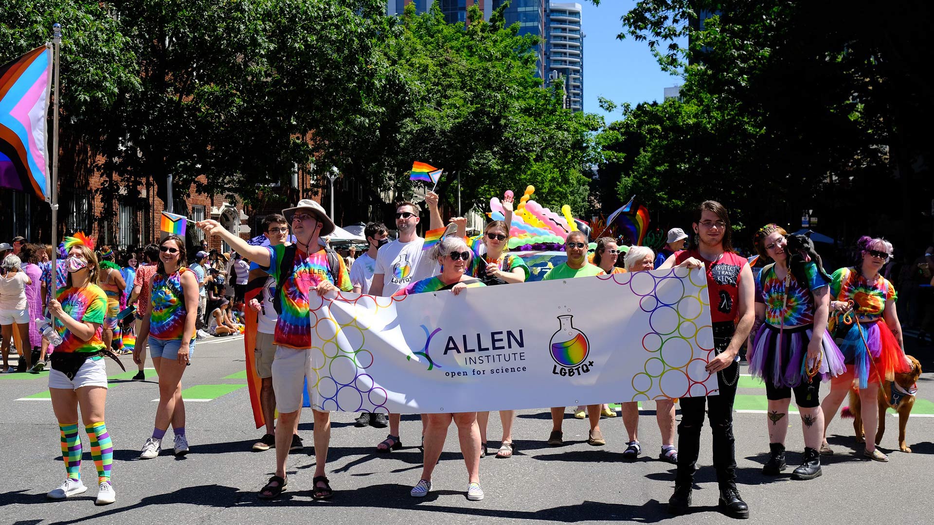 Allen Institute staff carrying banner at 2022 Seattle Pride Parade