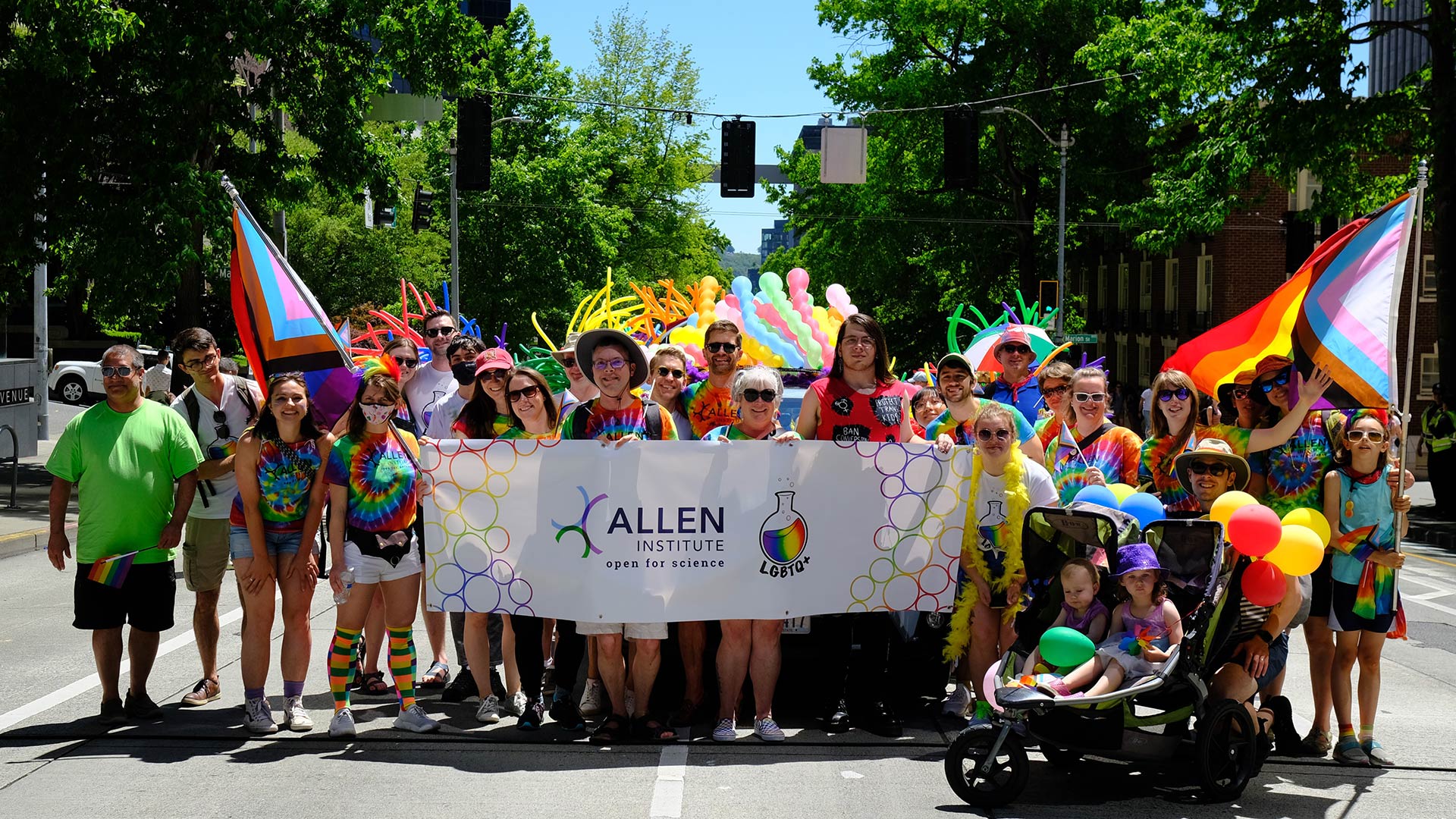 Allen Institute staff carrying banner at 2022 Seattle Pride Parade