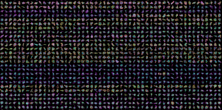 Hundreds of spinning cells against a black background