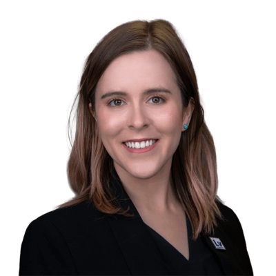 Woman smiles at camera.
