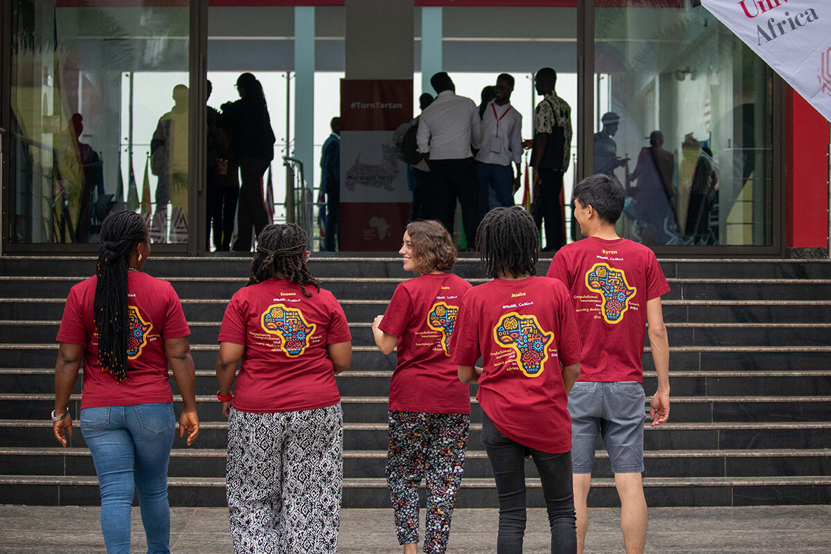 students walking onto campus