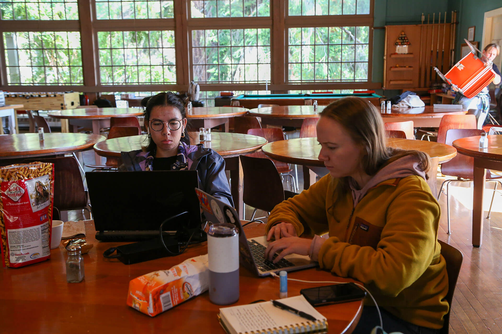 Students working on laptops in the dining hall of Friday Harbor Laboratories