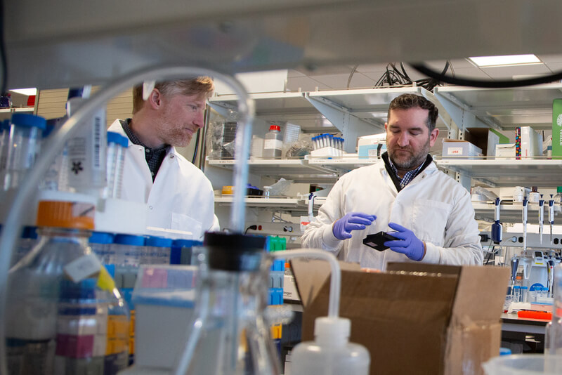 Boaz Levi and John Mich in the lab of the Allen Institute in Seattle, WA