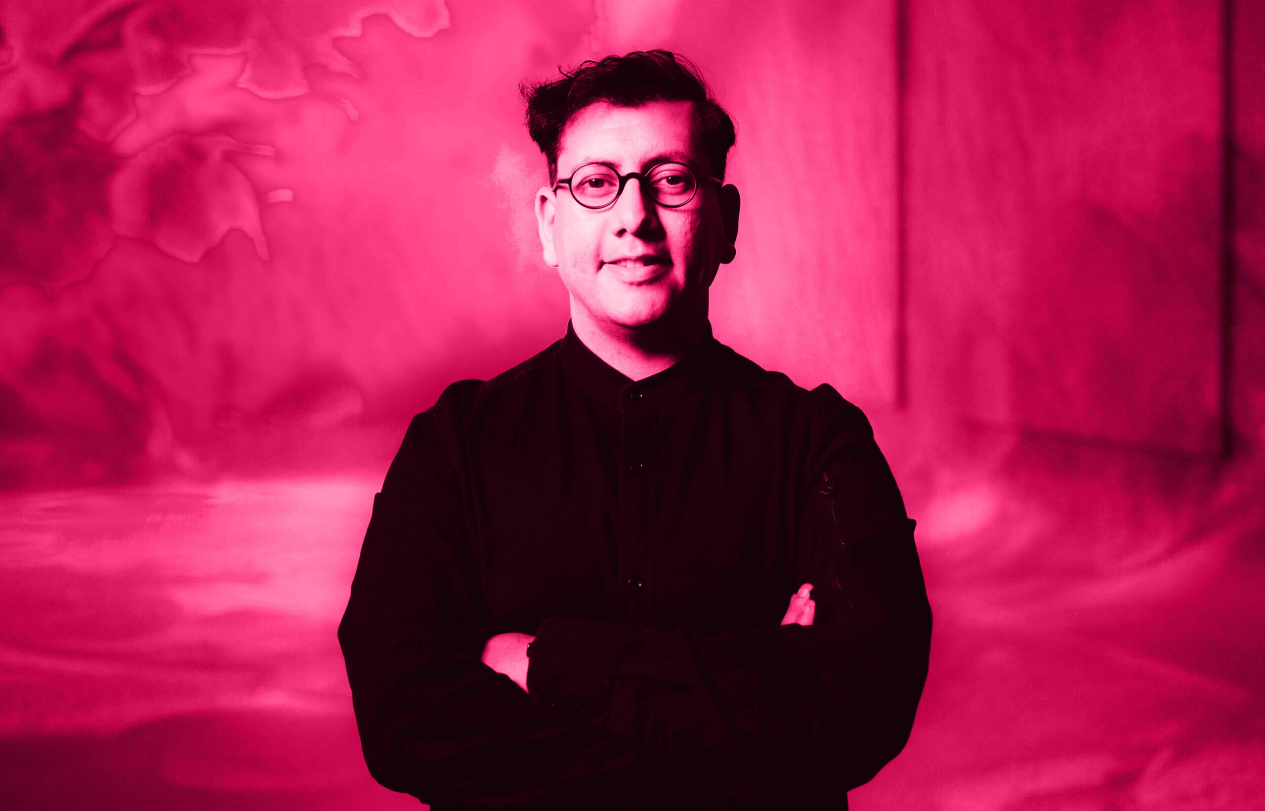 photo of Refik Anadol with pink color filter